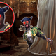Ash Parrish's Final Fantasy 14 avatar getting stepped on by Resident Evil Village's Lady Dimitrescu.